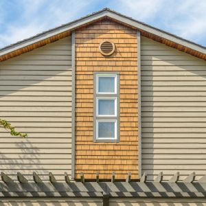 contemporary-house-with-shingle-detail-and-blue-sk-2026-03-26-10-48-21-utc